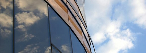 Reflective window tint film on an office building